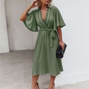 Surplice front butterfly sleeve belted dress